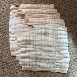 Five newborn 100% cotton cloth diapers